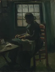 Femme cousant
